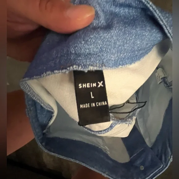 Like New! SHEIN X light blue denim skirt with an asymmetrical white ruffled hem - Picture 3 of 3